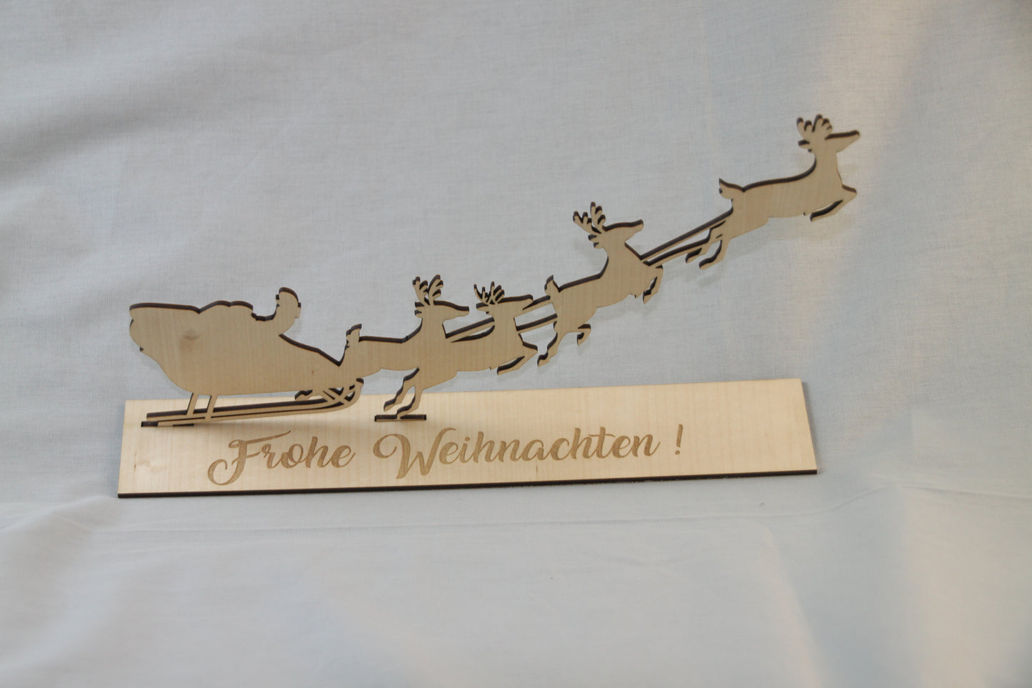 Weihnachtsmann mit Rentieren